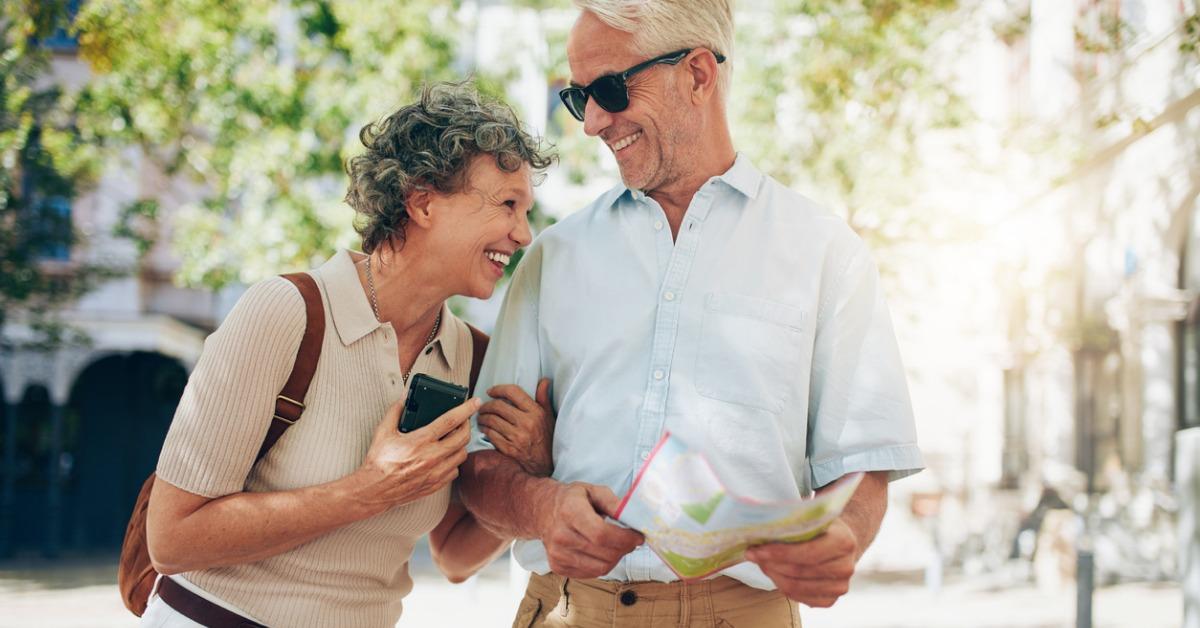 retired couple walking around the town picture id