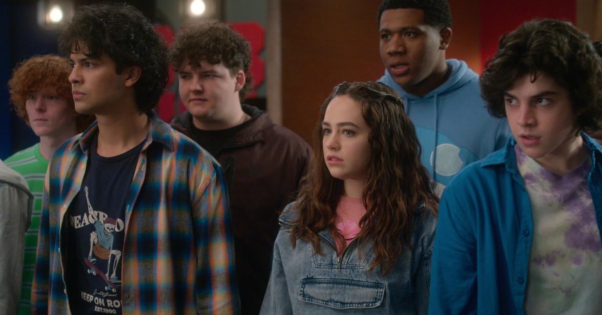 (Center, L to R) Xolo Maridueña as Miguel Diaz, Mary Mouser as Samantha LaRusso
