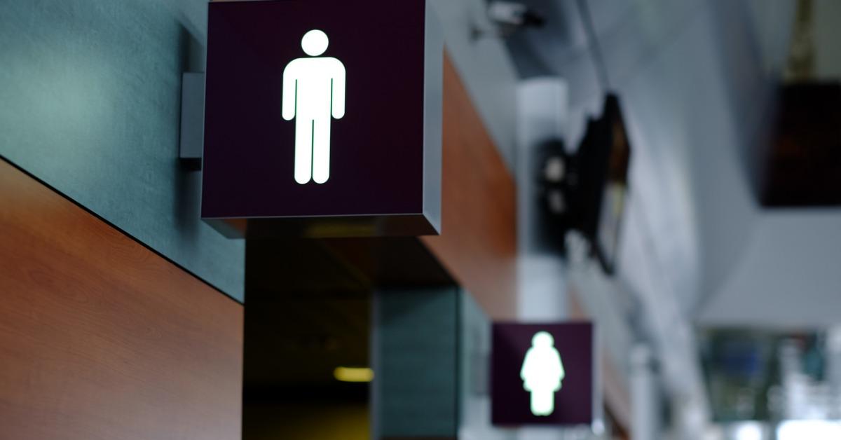 entrance to the male and female toilet sign in airport picture id