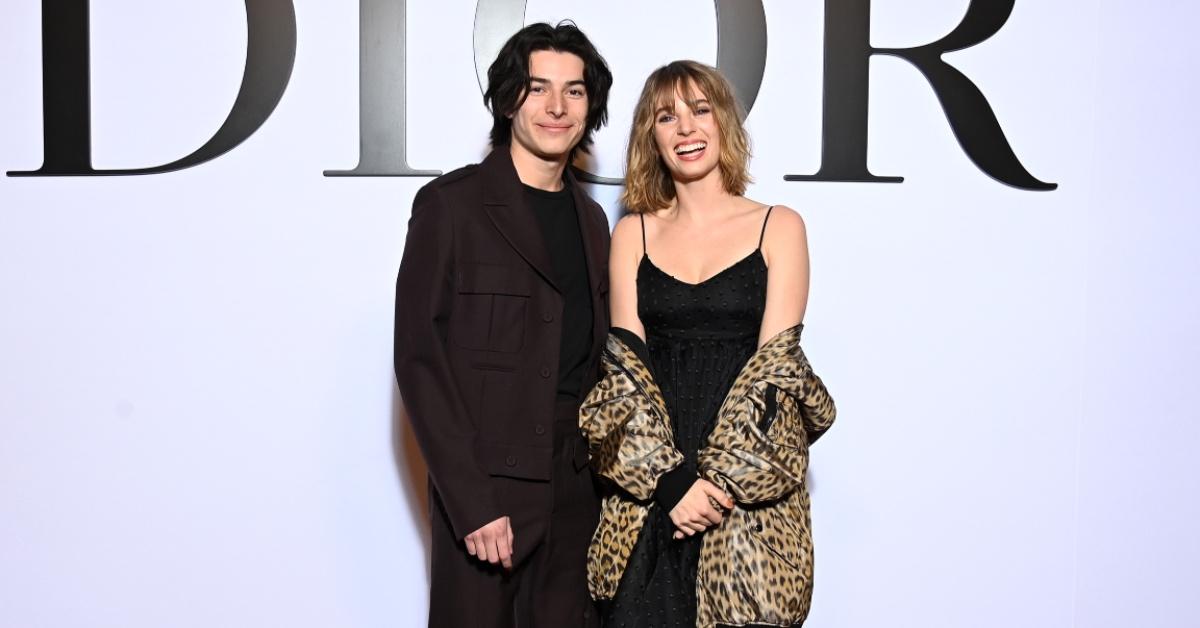 Maya Hawke and Spencer Barnett attend a Dior show.