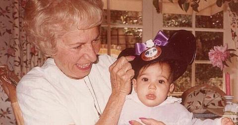 Helen Kardashian holding Kim Kardashian when she was a baby