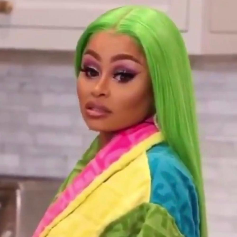 Blac Chyna looks irritated with bright green hair and tells cameraman to "cut the cameras." 