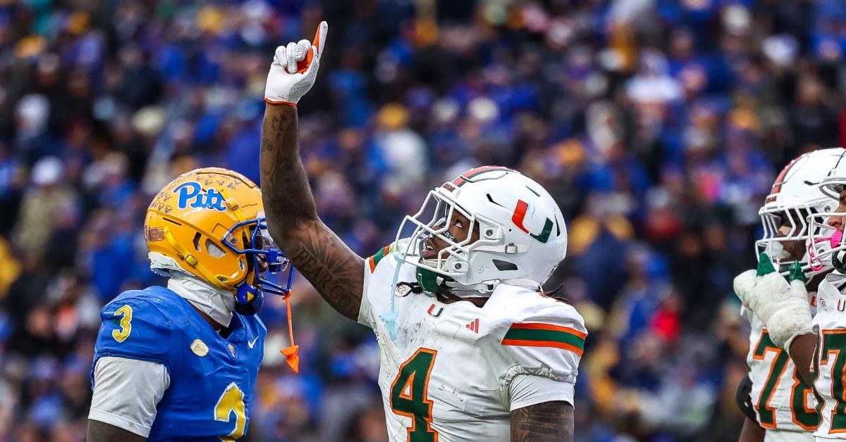Mark Fletcher Jr. points to the sky to give a "shoutout" to his dad.