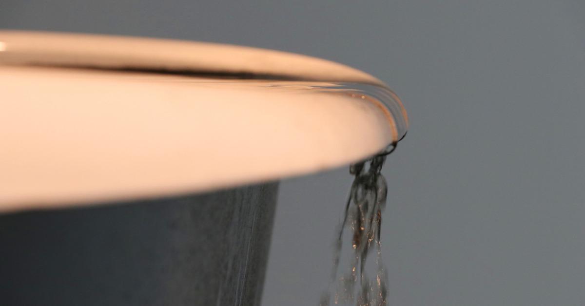 water spilling over a bathtub picture id