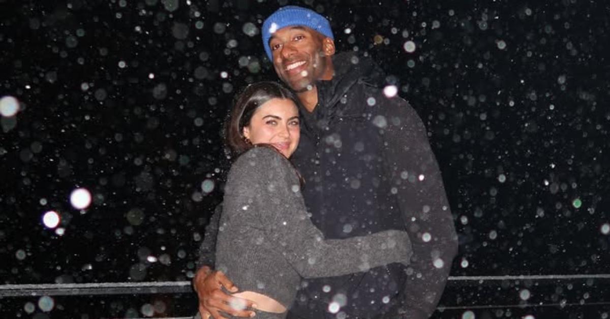 Matt James and Rachael Kirkconnell pose for a photo together in the snow in November 2024.