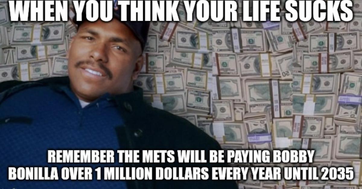 Bobby Bonilla laying on cash