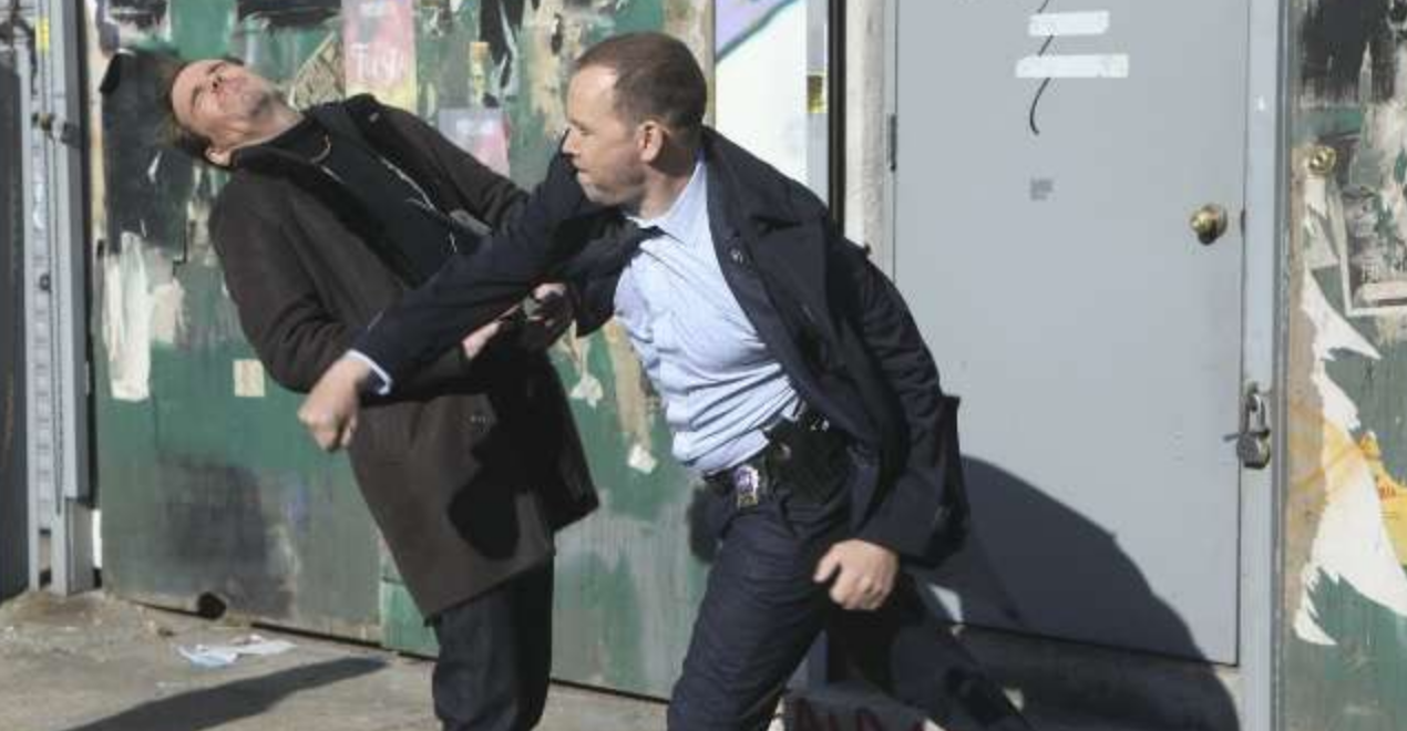 Danny punching a criminal on 'Blue Bloods'.