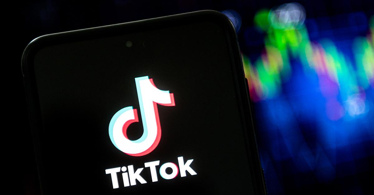 A TikTok logo on a phone screen. 