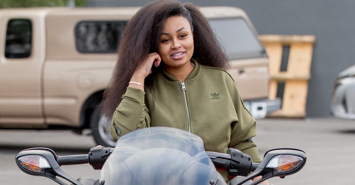 Blac Chyna sits on top of a motorcycle