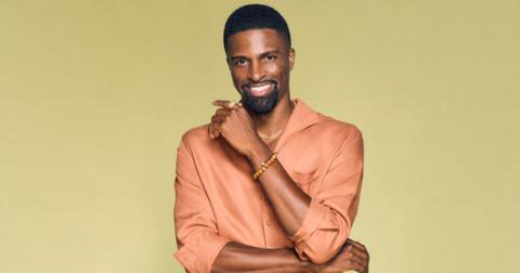 Alex Tyree wears an orange button up for his official 'Summer House: MV' Season 2 portrait.