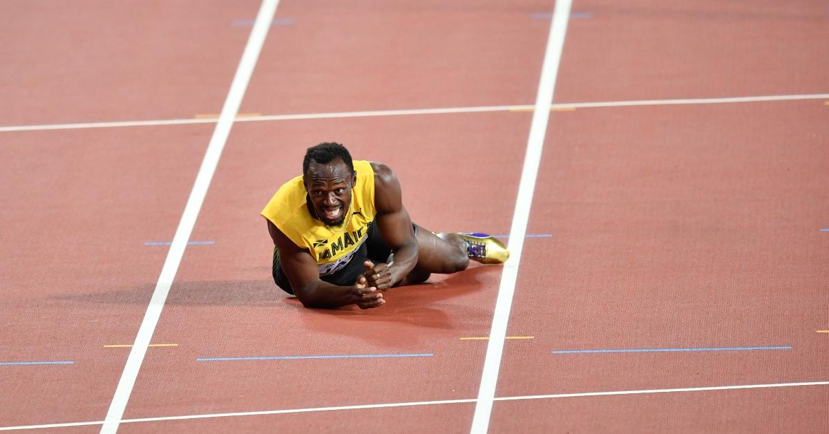 LONDON, UNITED KINGDOM - AUGUST 12: Usain Bolt of Jamaica falls during the Men's 4x100 Relay final at the "IAAF Athletics World Championships London 2017" at London Stadium in the Queen Elizabeth Olympic Park in London, United Kingdom on August 12, 2017. (Photo by Mustafa Yalcin/Anadolu Agency/Getty Images)