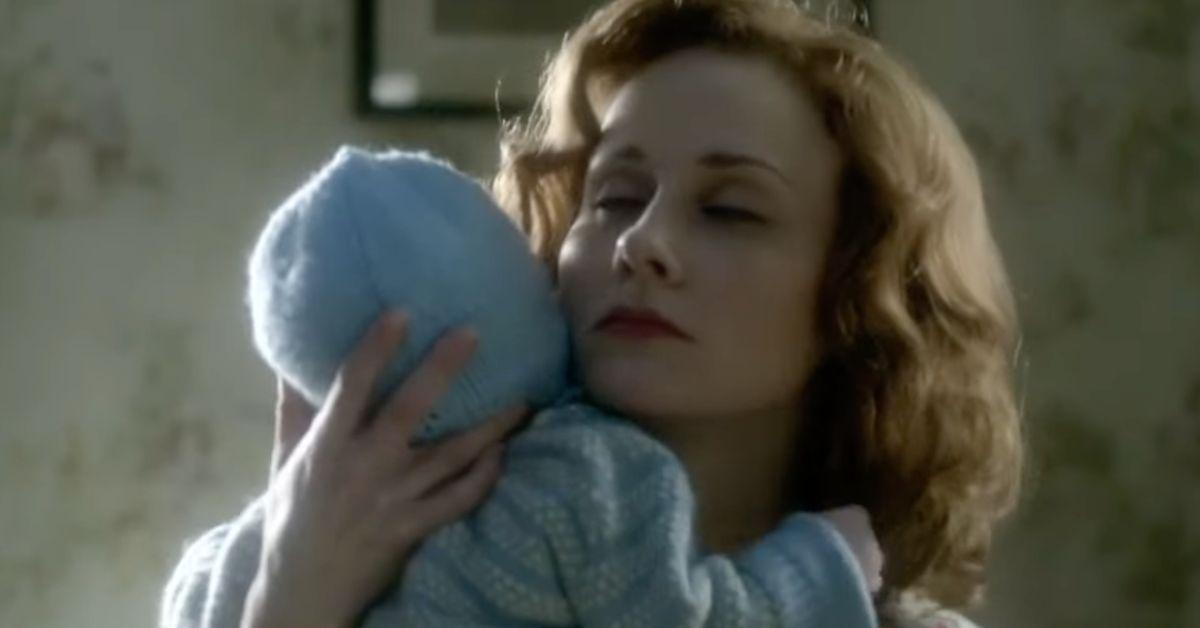 A Woman Holding a Baby