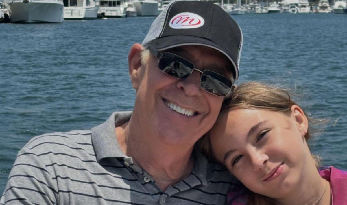 Barry and Samantha Williams smile together on a boat