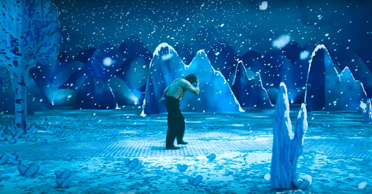 Beau (Joaquin Phoenix) ventures into an animated snowy landscape.