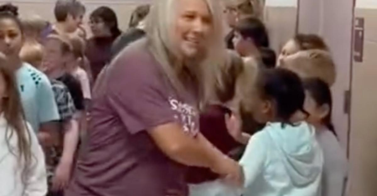 white teacher doesn't hug black student