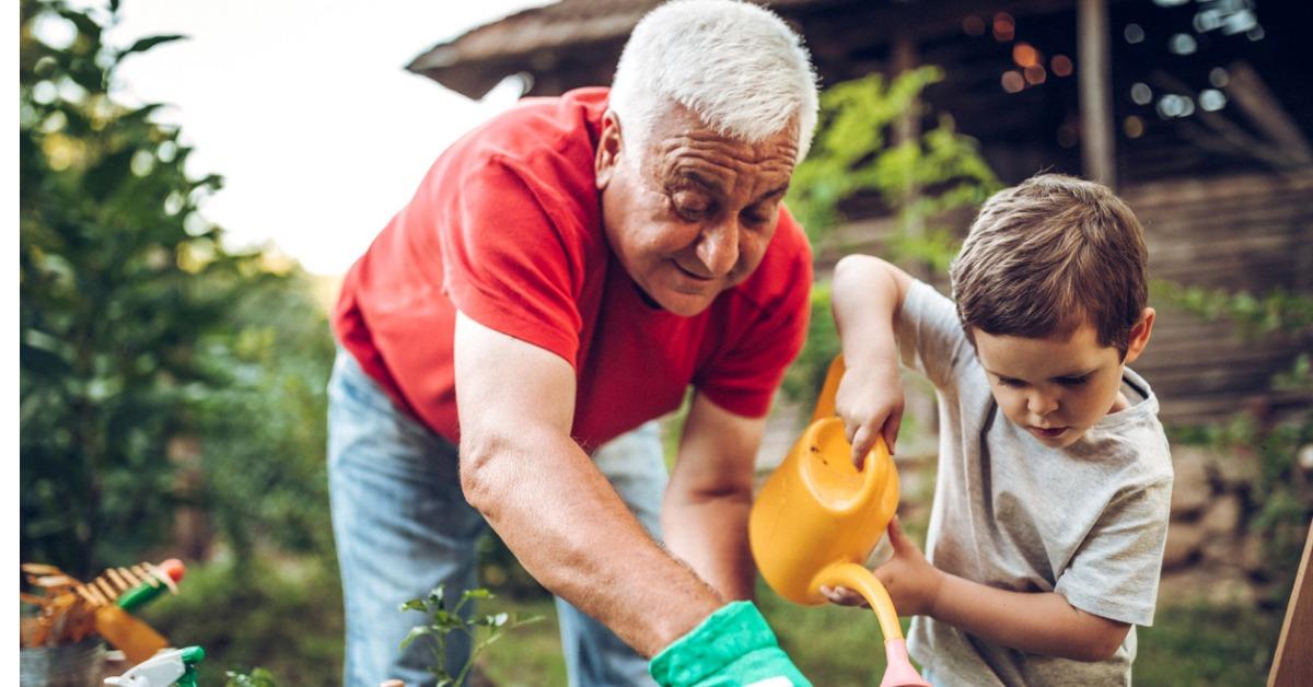 grandfather and grandson in garden picture id