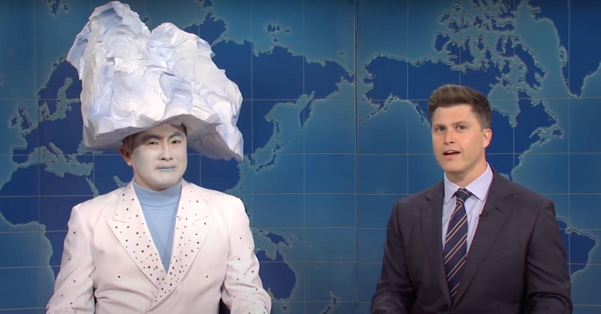 Bowen Yang and Colin Jost on an episode of 'SNL' during the Weekend Update segment.