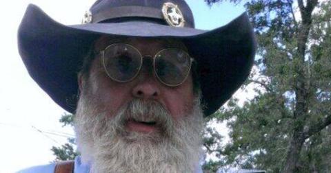 Jerry Dean Campbell sports a hat and long beard