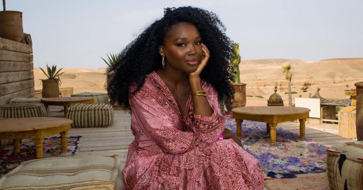 Melinda Berry dits outside on a terrace in Morocco