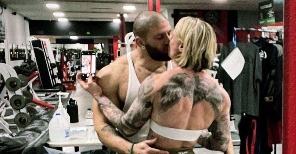 Jessica Heath kisses her husband at the gym.