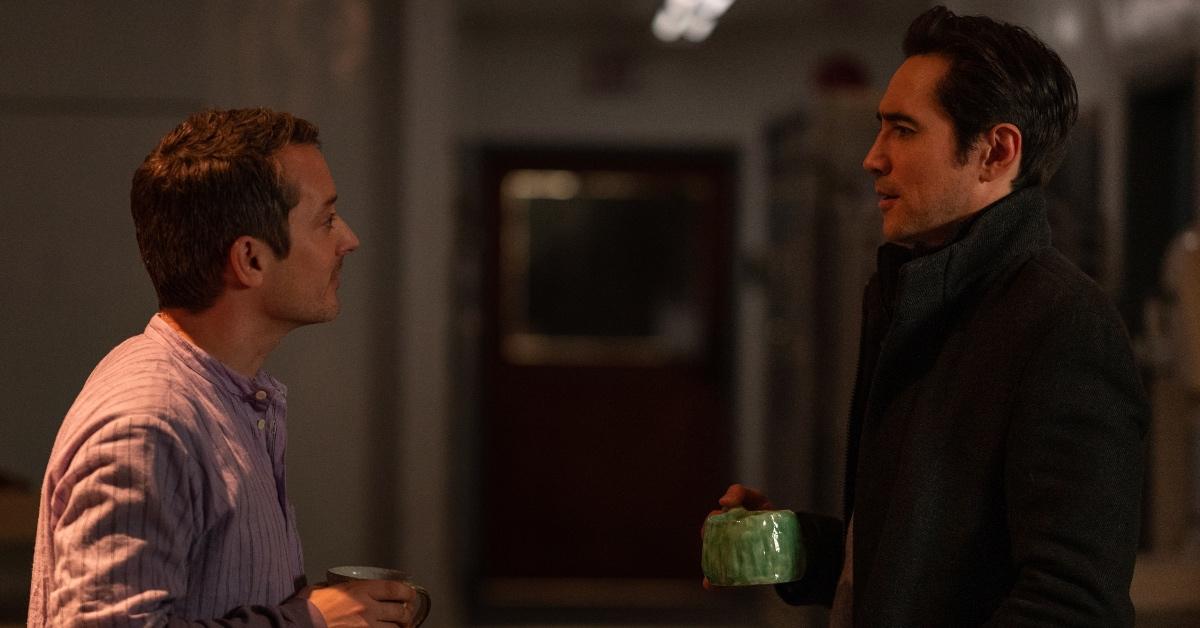 Walter (Elijah Wood) and Kevyn Tan (Alex Wyndham) have a conversation.