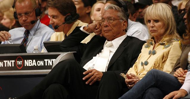 Donald Sterling sitting on the sideline during an NBA game on Nov. 2, 2006