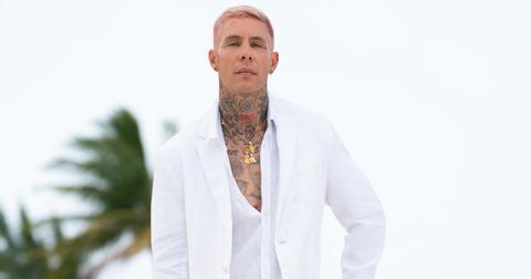 Aaron Bernardo wearing a white suit