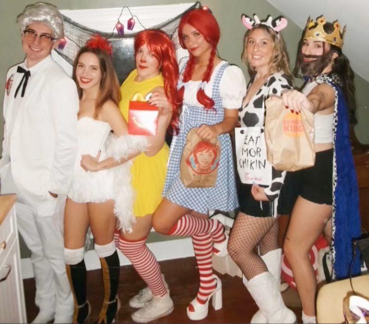 A group of people dressed up like fast-food restaurants for Halloween.
