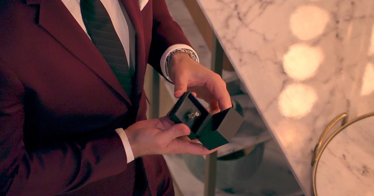 A man holds an engagement ring during Season 8 of 'Love Is Blind.'