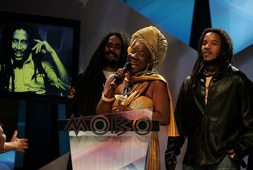 Rita Marley and her sons Damian Marley and Stephen Marley collect the posthumous Lifetime Achievement Award for Bob Marley.