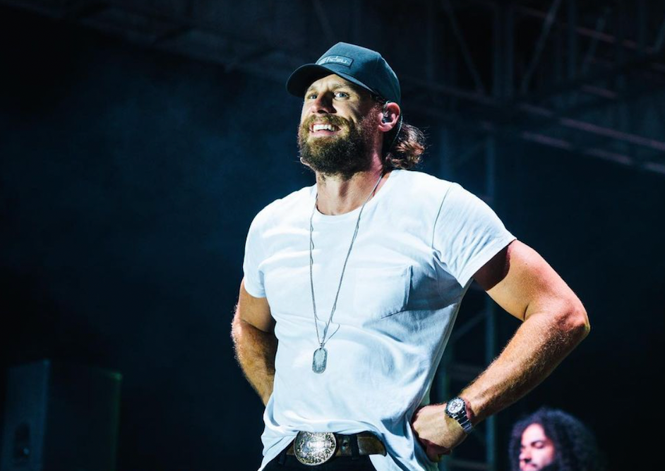 Chase Rice performing. 