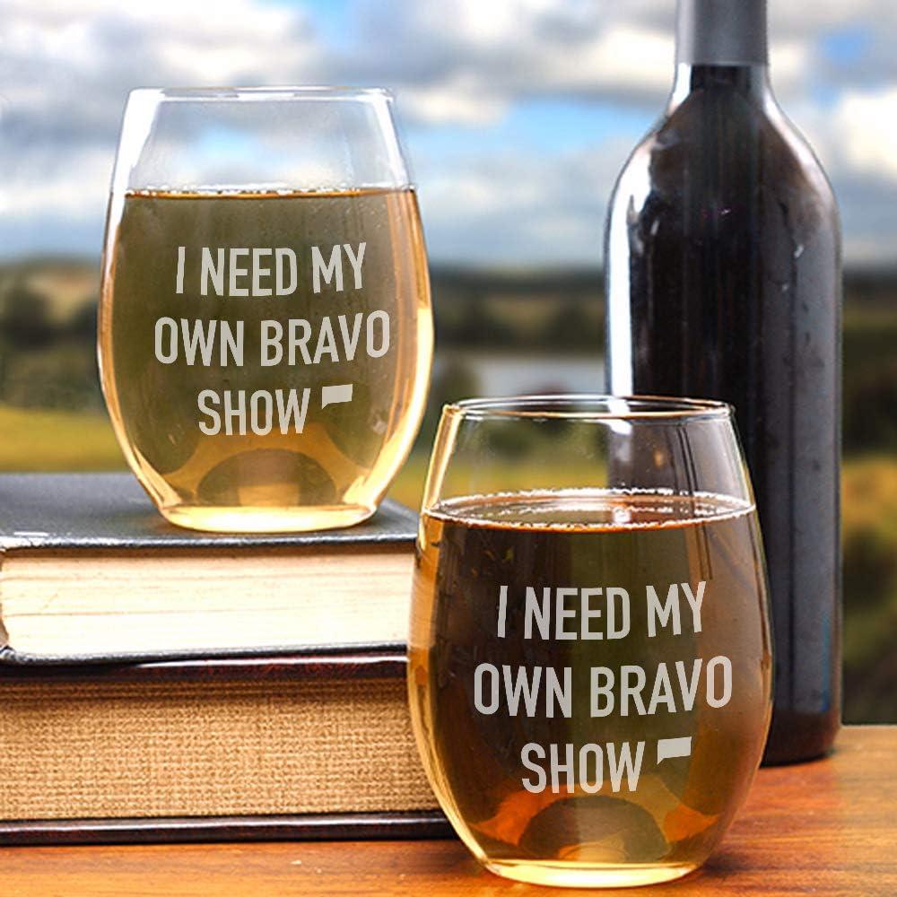 Wine glasses that read "I need my own Bravo show" and a wine bottle