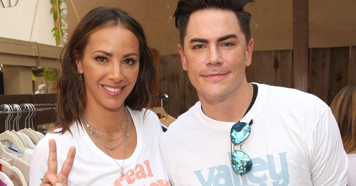 Kristin Doute holding up a peace sign with Tom Sandoval