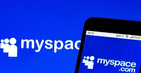 MySpace official logo against an iPhone