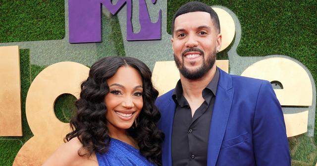 Brandi Marshall and Sean Marshall dressed in blue at 2022 MTV Movie and TV Awards Unscripted