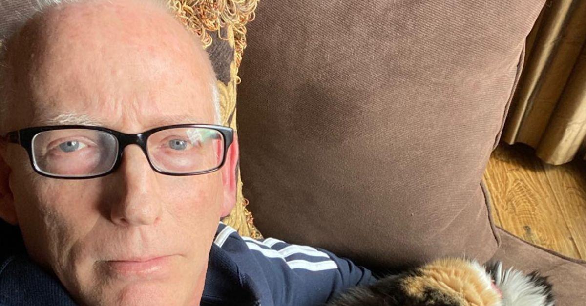 Scott Adams siting on his couch. 