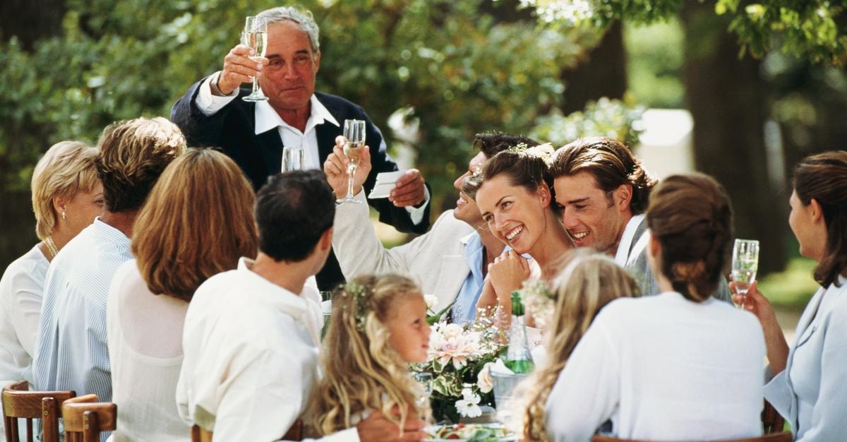 The father of bride giving a toast at a wedding reception  