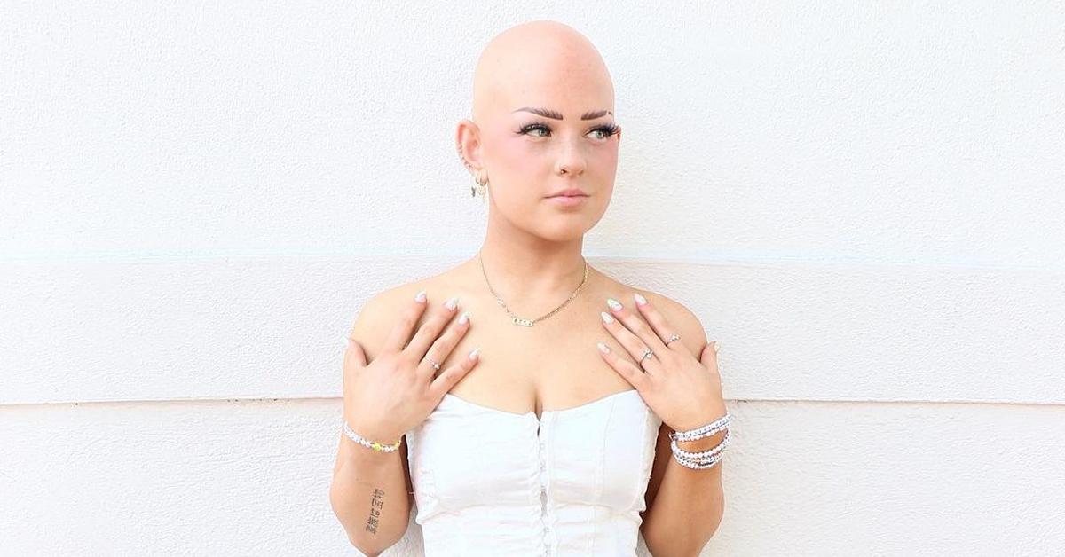 Headshot of social media star and makeup artist Emmy Combs against a white wall