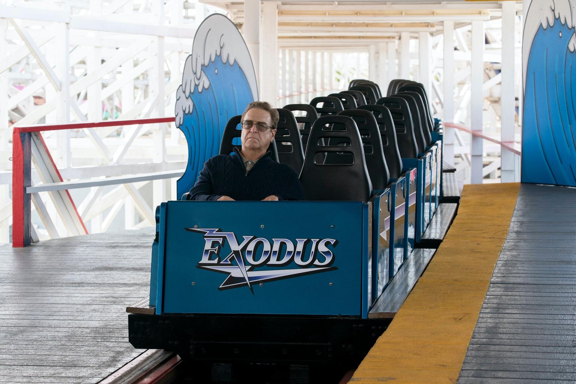 Eli Gemstone rides the Exodus rollercoaster, the one built over Marsh's body.