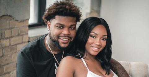 Jon Mitchell-Momoh and his girlfriend Monique Baugh smiling together