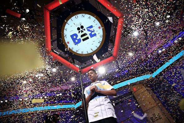 Confetti falls over Arvind Mahankali of Bayside Hills, New York after the finals of the 2013 Scripps National Spelling Bee