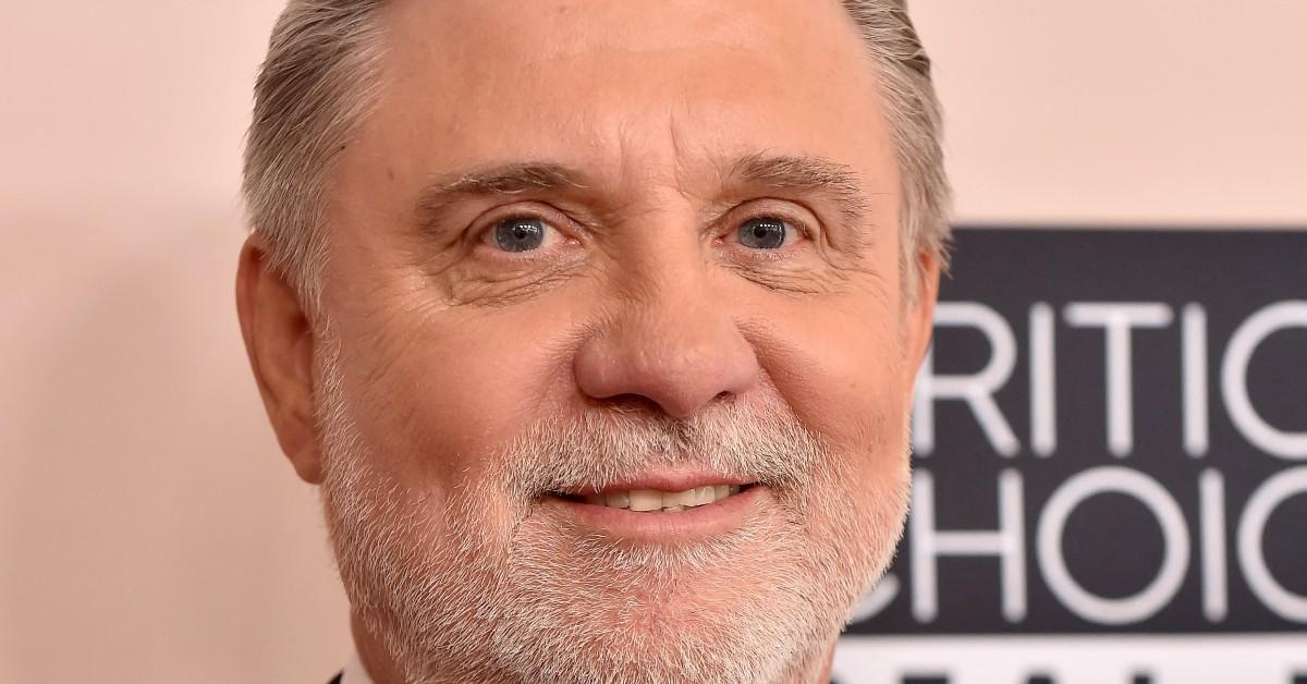 Mike Rinder at an award ceremony posing for a photo