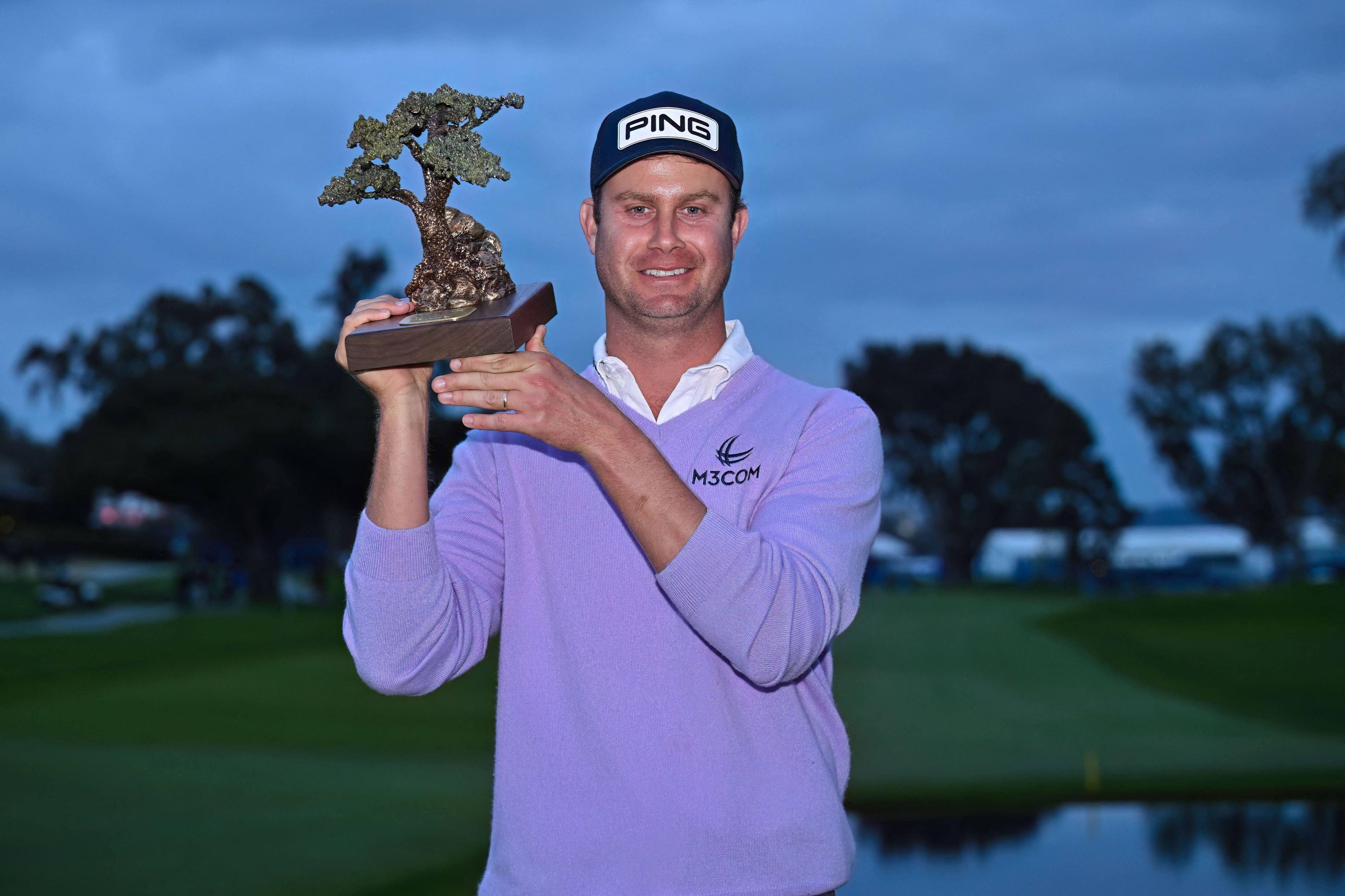 harris-english-holding-a-trophy