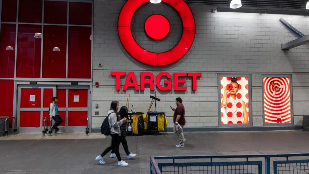 People walk by a Target store in the Harlem neighborhood in Manhattan on Sept. 28, 2023.