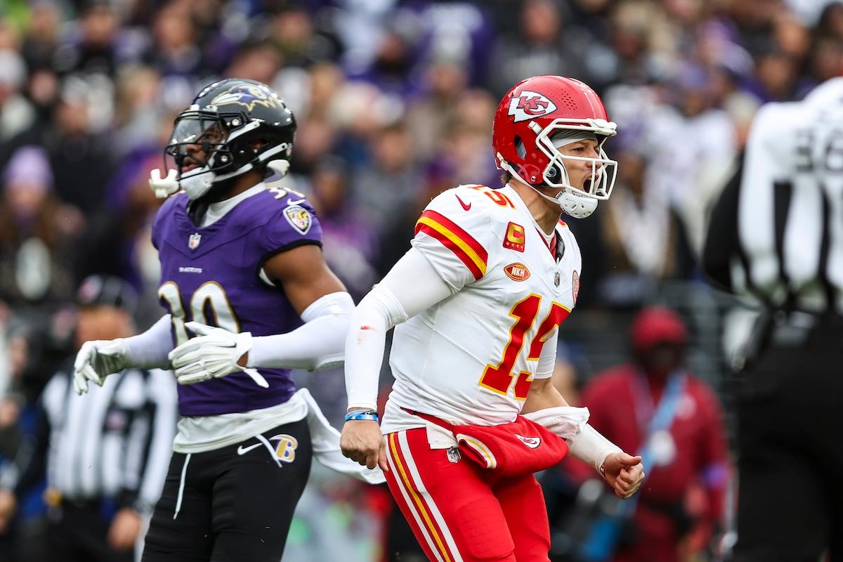 Patrick Mahomes celebrates on the field versus the Ravens in AFC Championship