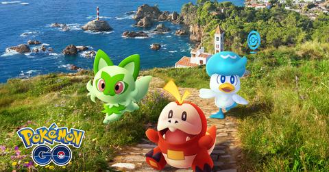 'Pokémon GO' Paldean creatures running up a beach side cliff.