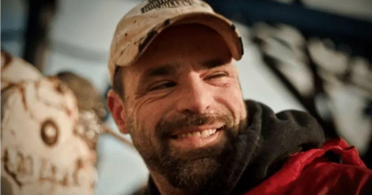 Matt Bradley smiles and looks off camera for a 'Deadliest Catch' promo photo