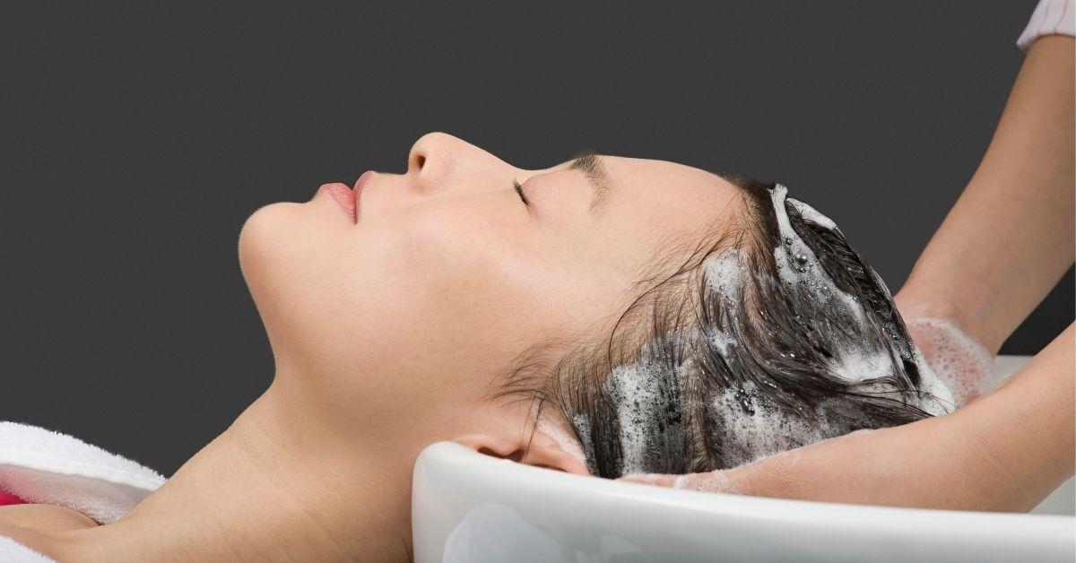 Woman getting her hair washed