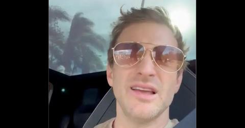 Keith Wasserman in sunglasses in a car.