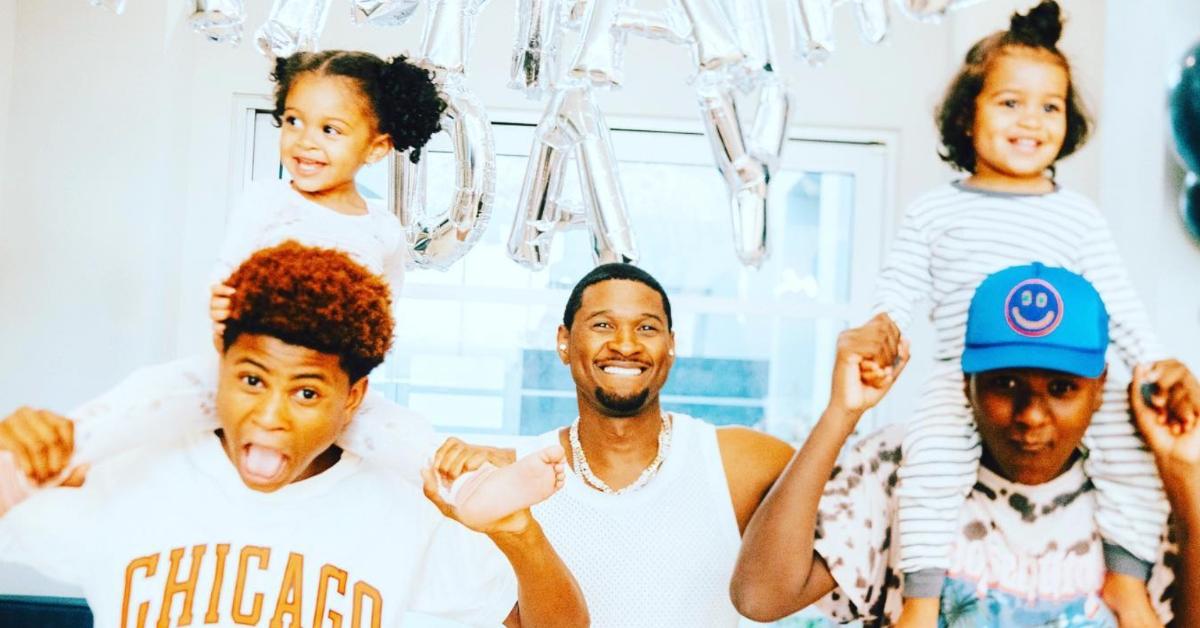 Usher with sons Cinco (Usher V), Naviyd, and Sire and daughter Sovereign